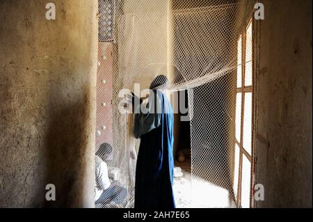 MALI, Djenne , Grand Mosque built from clay is an UNESCO world heritage, inside the mosque, entrance with curtain Stock Photo