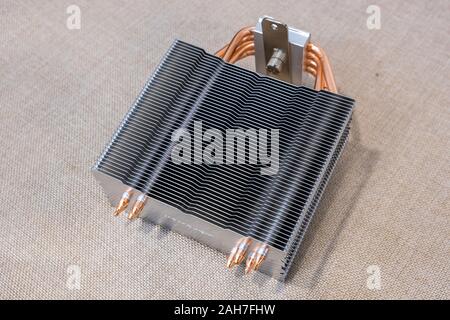Personal computer new part heating radiator cooler thermostat made from aluminum metal. Stock Photo
