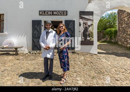 Szentendre, Hungary - July 01 2018: Tourist with jew pharmacist. Stock Photo