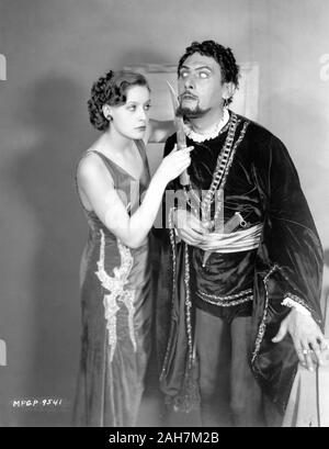 GRETA GARBO and actor LEW CODY 1926 Gag Publicity Photo by RUTH HARRIET LOUISE Metro Goldwyn Mayer Stock Photo