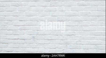 Modern white brick wall texture background for wallpaper and graphic web design . White brick wall background. Neutral texture of a flat brick wall cl Stock Photo