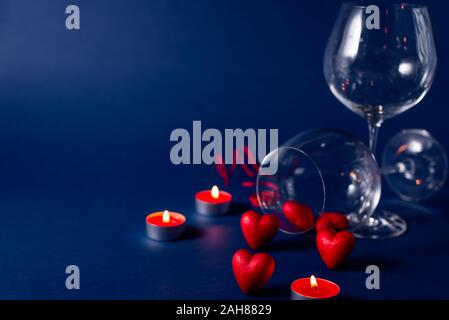 Valentine's day romantic background with hearts and candles. holiday background with hearts. Celebrating weddings and other celebrations with space fo Stock Photo