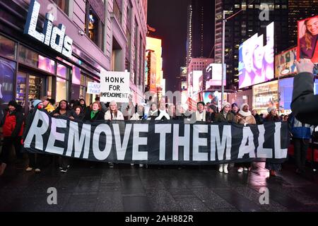 The New York City Coalition to Impeach and Remove join national demonstrations to demand an end to Donald Trump's presidency on December 17, 2019 in T Stock Photo