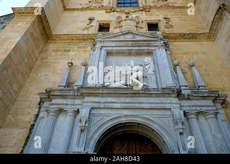 Sculpted depiction of St. Jerome on the exterior wall above the chapel's doorway at the Real Monasterio de San Jerónimo de Granada in Granada, Spain. Stock Photo