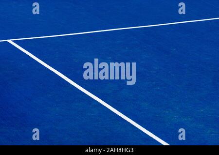 Blue paddle tennis court field with white lines background Stock Photo