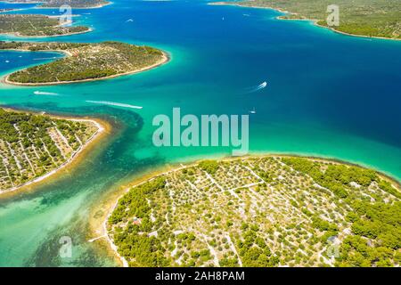 Adriatic coastline in Croatia, small islands in Murter archipelago, aerial view of turquoise bays from drone, touristic sailing paradise Stock Photo