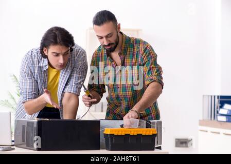 The it engineers working on hardware issue Stock Photo