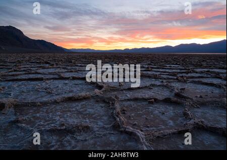 Colourful sunset over Badwater Basin in the Death Valley National Park in California on 15 Dec 2019 Stock Photo