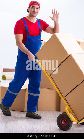 The contractor worker moving boxes during office move Stock Photo