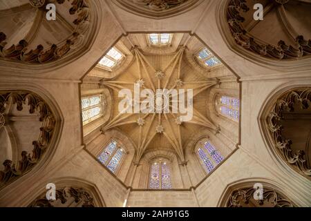 Leiria, Portugal - 20 August 2019: Ceiling and dome of the gothic structure of the Batalha Monastery near Leiria in Portugal Stock Photo