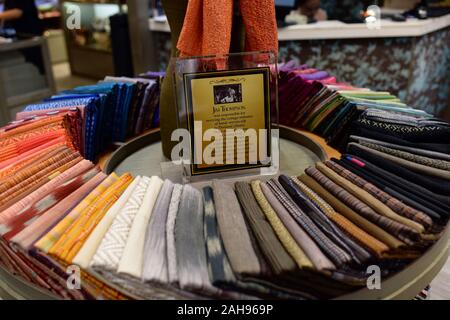 Traditional silk weavers of baan krua community in Bangkok, Thailand. These Cham Muslim community worked with Jim Thompson. Stock Photo