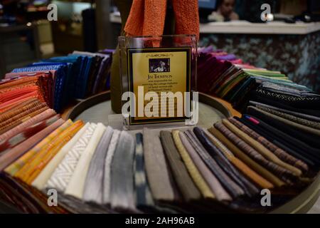 Traditional silk weavers of baan krua community in Bangkok, Thailand. These Cham Muslim community worked with Jim Thompson. Stock Photo