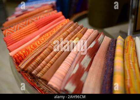 Traditional silk weavers of baan krua community in Bangkok, Thailand. These Cham Muslim community worked with Jim Thompson. Stock Photo