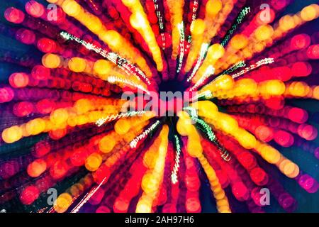 Abstract color circles of light created with bokeh and zoom busrt Stock Photo