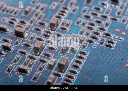 Chips and capacitors on the board. Microcircuits and capacitors on the board close-up. Stock Photo