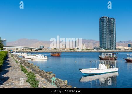 Ras al Khaimah, United Arab Emirates View the mountains and city on a clear blue sky day looking towards the Hajar Mountains. Stock Photo