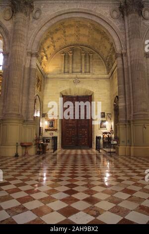 Exit door to the church of the Sacrarium in the Cathedral of Our Lady of Incarnation / 'the Cathedral' in the city centre Malaga Andalucia Spain Stock Photo