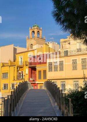 View across the Segura river to the old quarter of Orihuela. On the other side  the Episcopal Palace dome and the cathedral's bell tower, Orihuela, Co Stock Photo