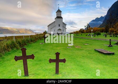 Crosses in cemetery and church, Gimsoy, Lofoten, Norway Stock Photo