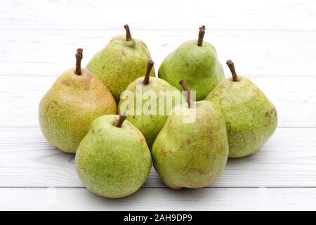 Green ripe pears on a white table background. in studio shot Stock Photo