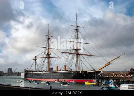 HMS Warrior was Britain's first iron hull battleship built in 1860 and is moored in Portsmouth, UK Stock Photo