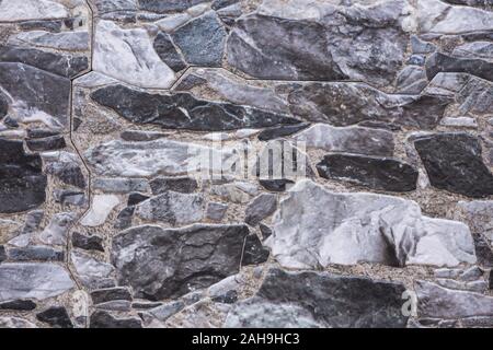 The pebble stone floors and wall, background textures. Cold color tones. Stock Photo