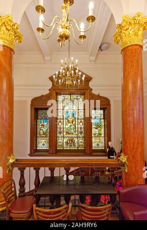 EDINBURGH SCOTLAND INSIDE DEBENHAMS STORE ON PRINCES STREET THREE STAINED GLASS WINDOWS DEDICATED TO THE MEMORY OF BENJAMIN DISRAELI IN 1884 Stock Photo