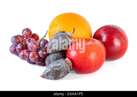 Grape, apple, orange and dry persimmon isolated on white background. Stock Photo