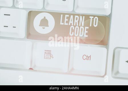 Handwriting text Learn To Code. Conceptual photo Learn to write Software Be a Computer Programmer Coder Stock Photo