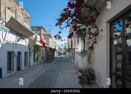 GREECE, KOS - MAY 31: Kardamena is a small town on the south coast of Kos and has all the makings of a great beach holiday. Empty central market stree Stock Photo