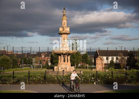 13.07.2019, Belfast, Northern Ireland, Great Britain - Boy with bicycle, Dunville Park on Falls Road, Catholic West Belfast. 00A190713D119CAROEX.JPG [ Stock Photo