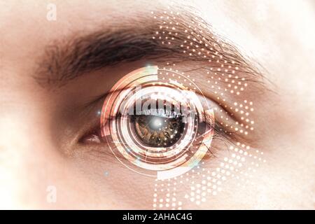 close up view of man brown eye with data illustration, robotic concept Stock Photo