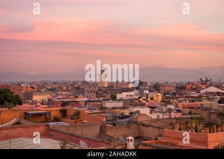 Marrakech city skyline in Medina area, with Atlas mountains behind, Marrakesh-Safi region, Morocco, north Africa. Stock Photo