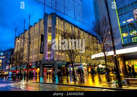 Department stored on Oxford Street decorated with Christmas lights, London, UK Stock Photo