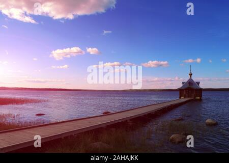 Lake bathhouse Chapel of St. John the Baptist.of Vazheozersky Spaso-Preobrazhensky male Monastery, village Interposelyok, Republic of Karelia, Russia Stock Photo