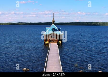 Lake bathhouse Chapel of St. John the Baptist.of Vazheozersky Spaso-Preobrazhensky male Monastery, village Interposelyok, Republic of Karelia, Russia Stock Photo