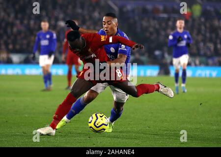 Liverpool's Naby Keita (left) and Leicester City's Youri Tielemans battle for the ball during the Premier League match at the King Power Stadium, Leicester. Stock Photo