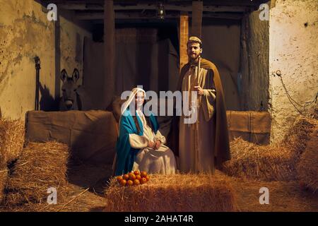 Italy, Sicily, Partinico, December 22/2019, beautiful living nativity scene from the Parrini district, Maria and Joseph in the stable Stock Photo