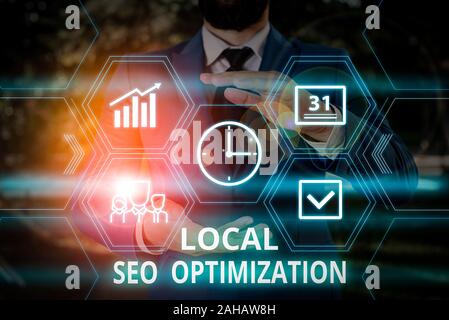 Word writing text Local Seo Optimization. Business photo showcasing increase Search Visibility to Rank on Top list Male human wear formal work suit pr Stock Photo