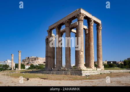 Athens Greece.The Temple of Olympian Zeus. The Acropolis and the Partrhenon in the background Stock Photo