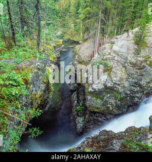 waterfall plunging into a gorge on the upper jocko river near arlee, montana Stock Photo