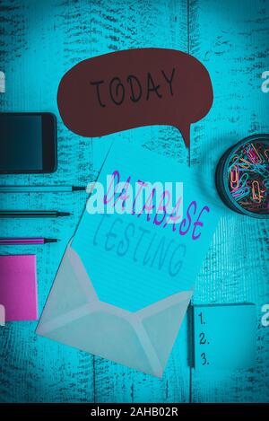 Handwriting text Database Testing. Conceptual photo involves the retrieved values from the database by the web Envelop speech bubble smartphone sheet Stock Photo