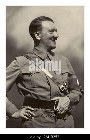 ADOLF HITLER (1889-1945) Fuhrer of the Third Reich Germany 1934-1945. signed promotional propaganda postcard photograph. Adolf Hitler in Nazi military uniform wearing a swastika armband. Signed by Adolf Hitler Stock Photo