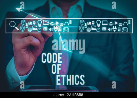 Writing note showing Code Of Ethics. Business concept for Moral Rules Ethical Integrity Honesty Good procedure Stock Photo