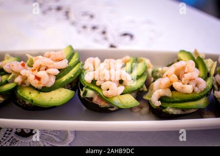 avocado salad with prawns on plate Stock Photo