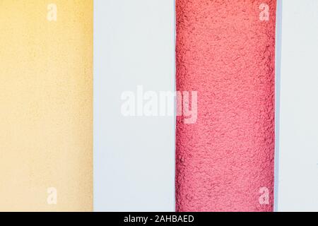 Coral yellow white concrete stripes wall background texture Stock Photo