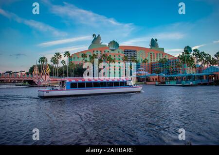 Orlando, Florida.  December 18, 2019. Walt Disney World Swan Hotel and taxi boat in Lake Buena Vista area Stock Photo
