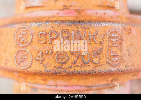 Rusty old orange sprinkler pipe background texture Stock Photo