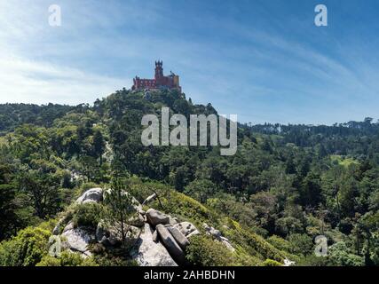 Pena Palace monument on the hilltop seen from the Castle of the Moors near Sintra in Portugal Stock Photo