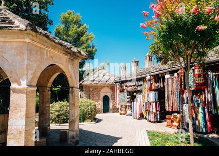 Koski Mehmed Pasha mosque and souvenir shop in Mostar, Bosnia and Herzegovina Stock Photo